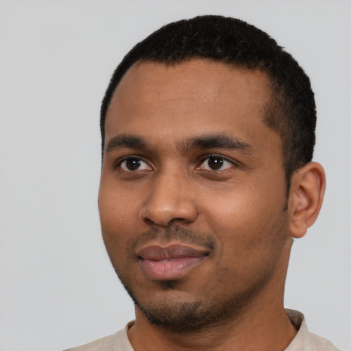 Neutral black young-adult male with short  black hair and brown eyes