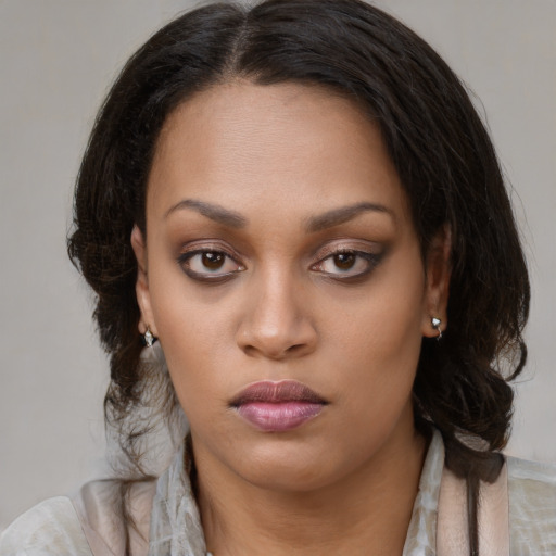 Neutral latino young-adult female with medium  brown hair and brown eyes
