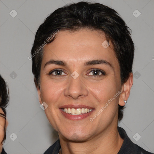 Joyful white adult female with medium  brown hair and brown eyes