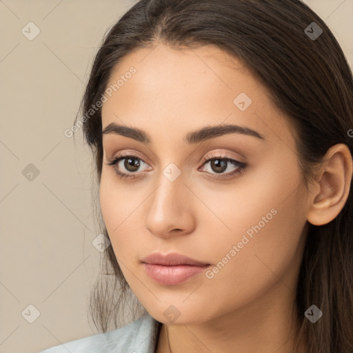 Neutral white young-adult female with long  brown hair and brown eyes