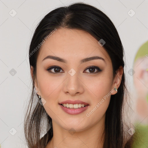 Joyful latino young-adult female with long  brown hair and brown eyes