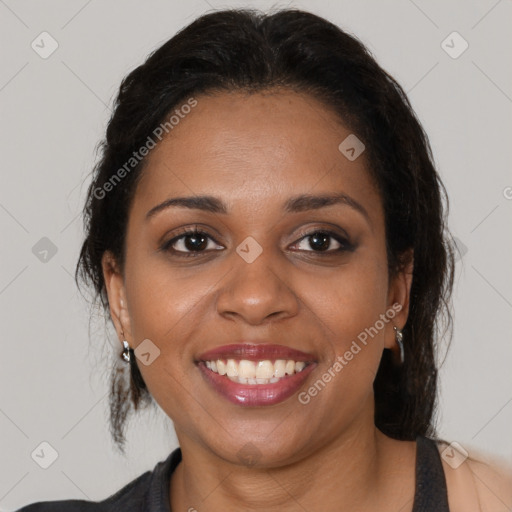 Joyful black young-adult female with medium  brown hair and brown eyes