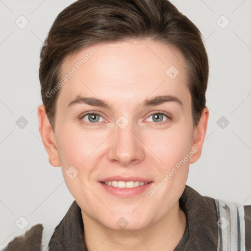 Joyful white young-adult female with short  brown hair and grey eyes