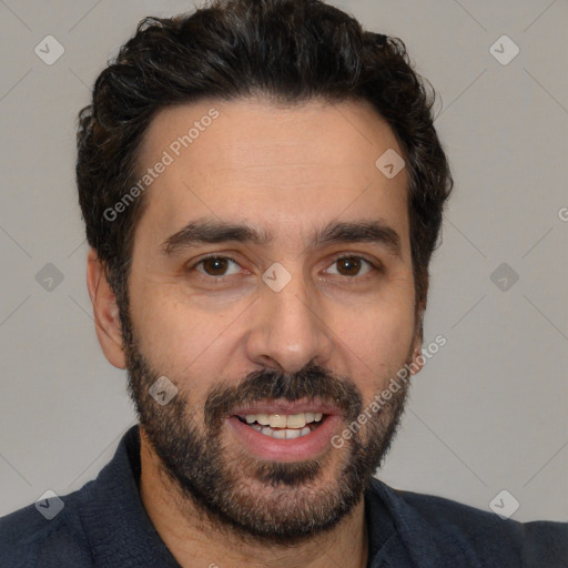 Joyful white young-adult male with short  black hair and brown eyes