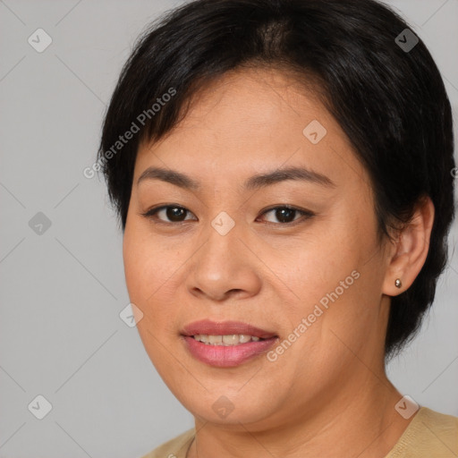 Joyful asian young-adult female with medium  brown hair and brown eyes