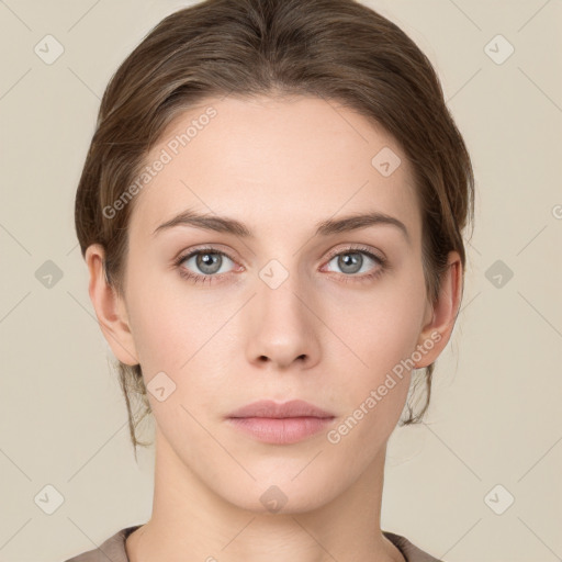 Neutral white young-adult female with medium  brown hair and grey eyes