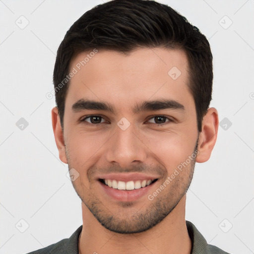 Joyful white young-adult male with short  brown hair and brown eyes