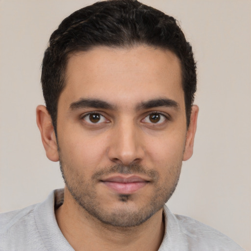 Neutral latino young-adult male with short  brown hair and brown eyes