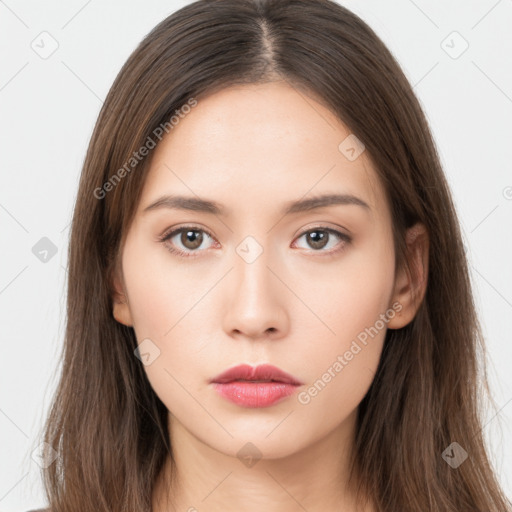 Neutral white young-adult female with long  brown hair and brown eyes