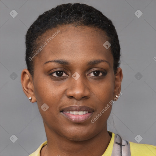 Joyful black young-adult female with short  black hair and brown eyes