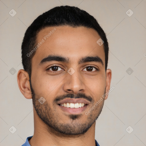 Joyful latino young-adult male with short  black hair and brown eyes