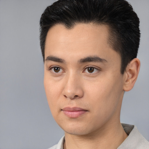 Neutral white young-adult male with short  black hair and brown eyes