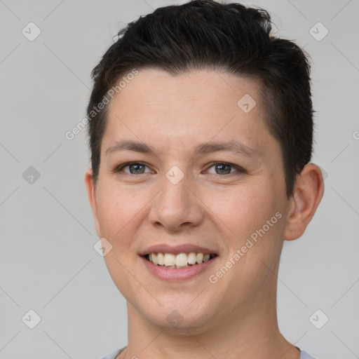 Joyful white young-adult female with short  brown hair and brown eyes