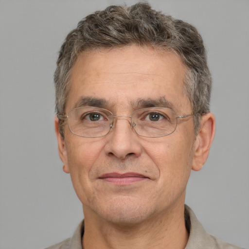 Joyful white middle-aged male with short  brown hair and brown eyes