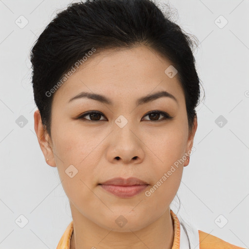Joyful asian young-adult female with short  brown hair and brown eyes