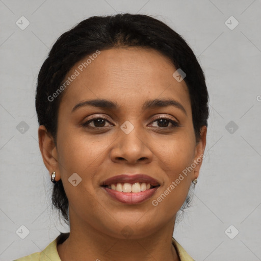 Joyful latino young-adult female with short  black hair and brown eyes