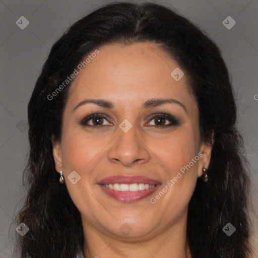 Joyful white adult female with long  brown hair and brown eyes