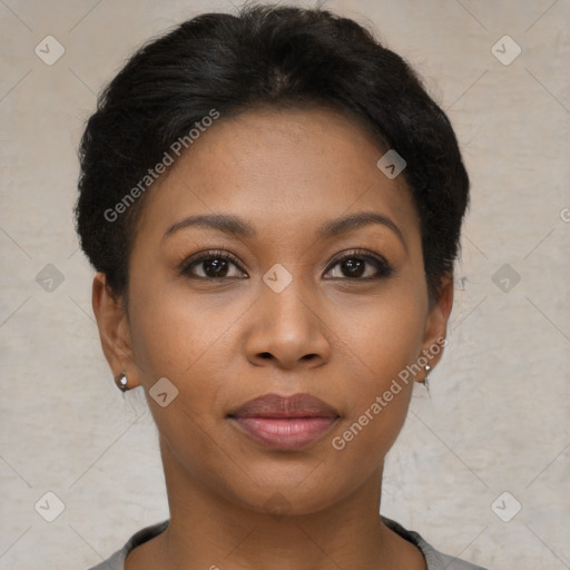 Joyful black young-adult female with short  brown hair and brown eyes