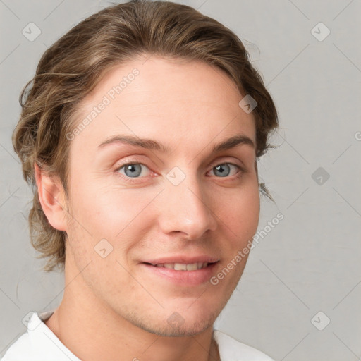 Joyful white young-adult female with short  brown hair and grey eyes