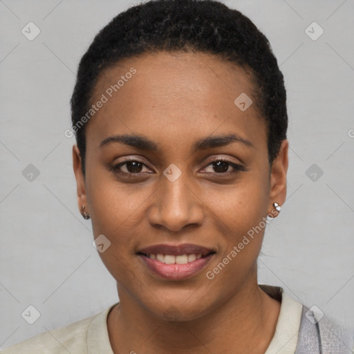 Joyful black young-adult female with short  black hair and brown eyes