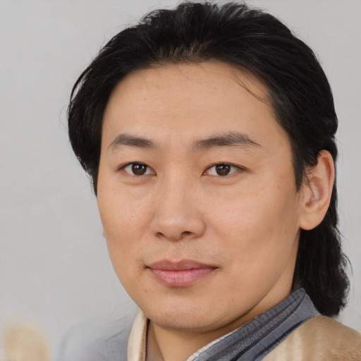 Neutral asian young-adult male with medium  brown hair and brown eyes