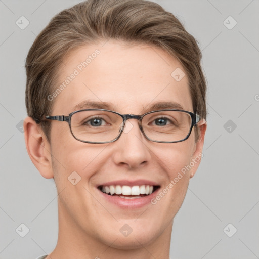 Joyful white adult female with short  brown hair and grey eyes