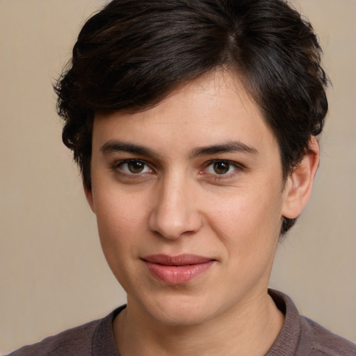 Joyful white young-adult male with medium  brown hair and brown eyes