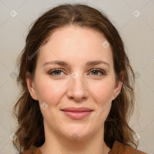 Joyful white young-adult female with medium  brown hair and green eyes