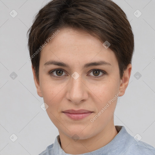 Joyful white young-adult female with short  brown hair and grey eyes