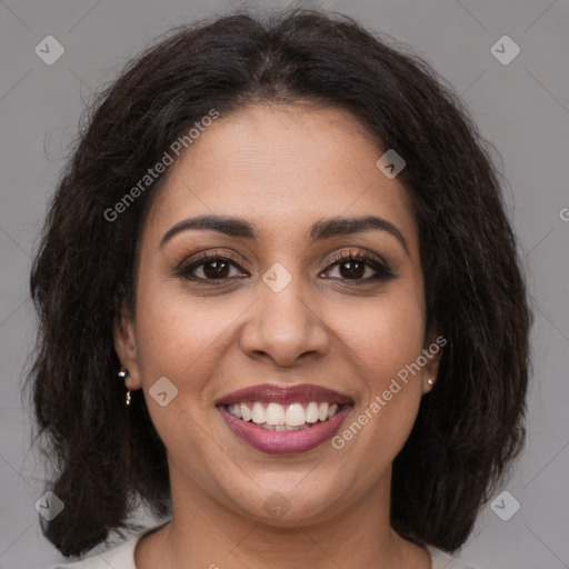 Joyful latino young-adult female with medium  brown hair and brown eyes