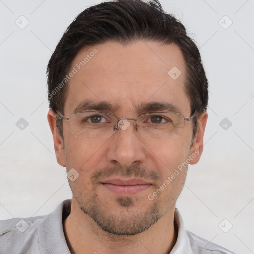 Joyful white adult male with short  brown hair and brown eyes