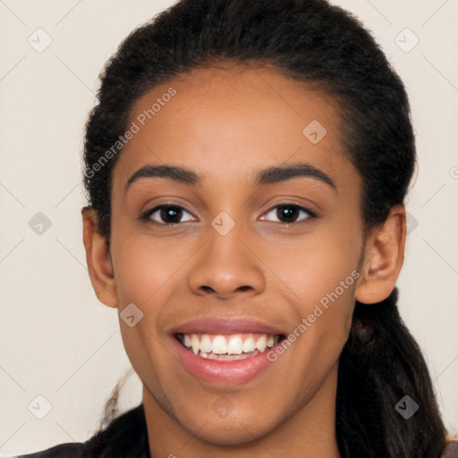 Joyful latino young-adult female with long  black hair and brown eyes