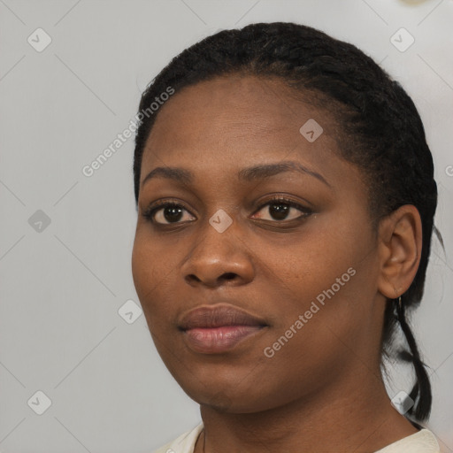 Neutral black young-adult female with short  black hair and brown eyes