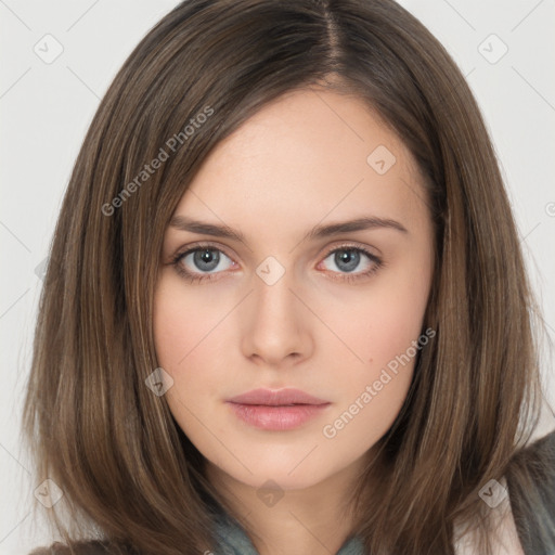 Neutral white young-adult female with long  brown hair and brown eyes