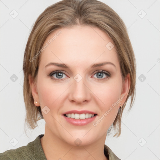 Joyful white young-adult female with medium  brown hair and blue eyes