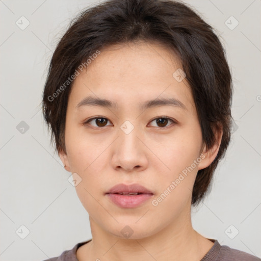 Neutral asian young-adult female with short  brown hair and brown eyes