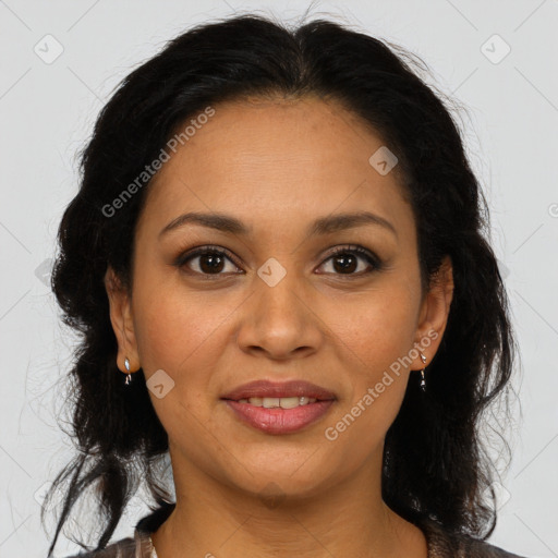 Joyful latino adult female with medium  brown hair and brown eyes