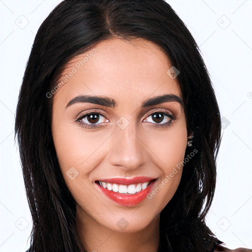 Joyful white young-adult female with long  brown hair and brown eyes