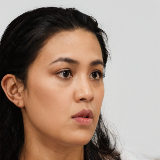Neutral latino young-adult female with medium  black hair and brown eyes