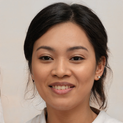 Joyful white young-adult female with medium  brown hair and brown eyes