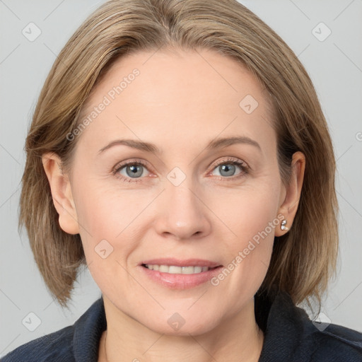 Joyful white young-adult female with medium  brown hair and blue eyes