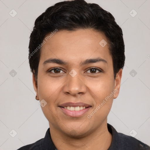 Joyful white young-adult male with short  black hair and brown eyes