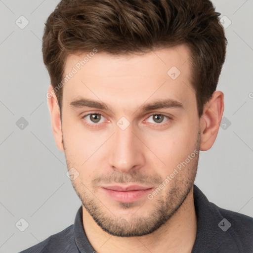 Neutral white young-adult male with short  brown hair and brown eyes