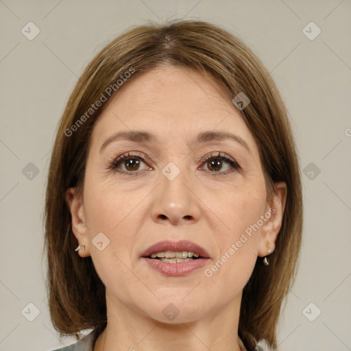 Joyful white adult female with medium  brown hair and brown eyes