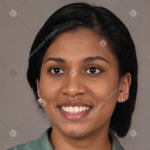 Joyful latino young-adult female with medium  black hair and brown eyes