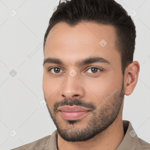 Joyful white young-adult male with short  brown hair and brown eyes