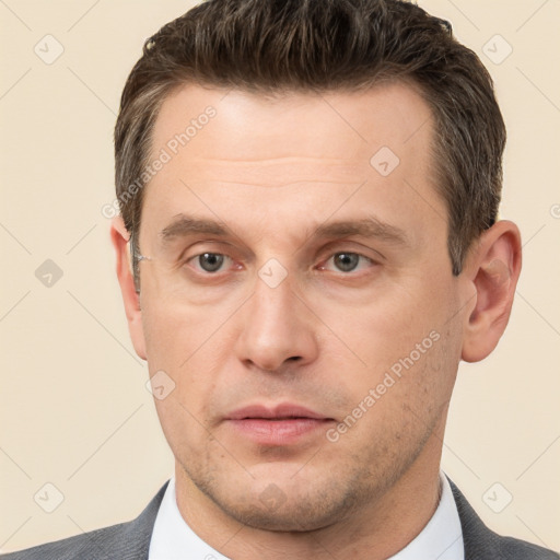 Neutral white adult male with short  brown hair and brown eyes