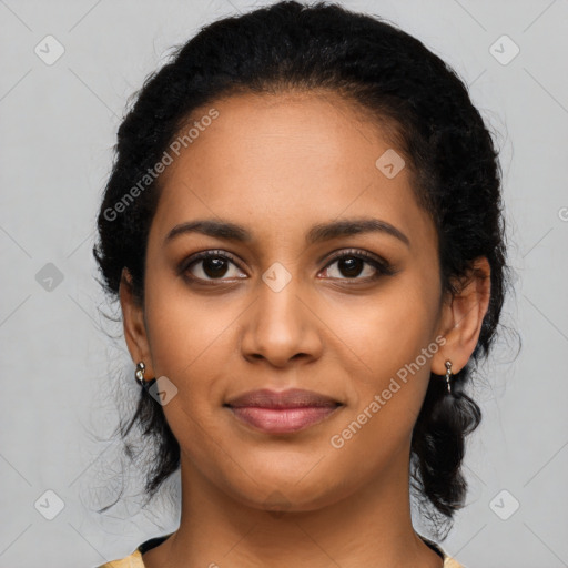 Joyful latino young-adult female with long  black hair and brown eyes