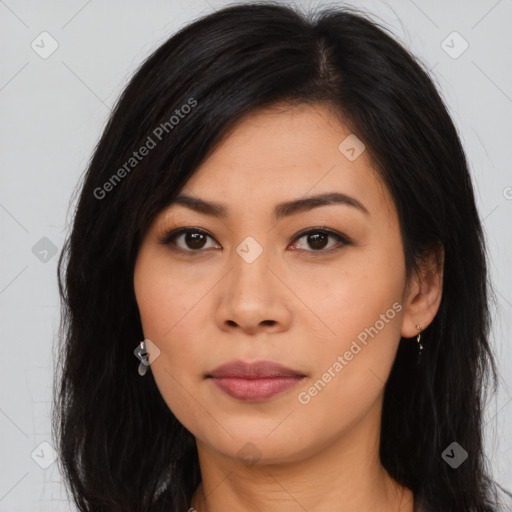 Joyful asian young-adult female with long  brown hair and brown eyes