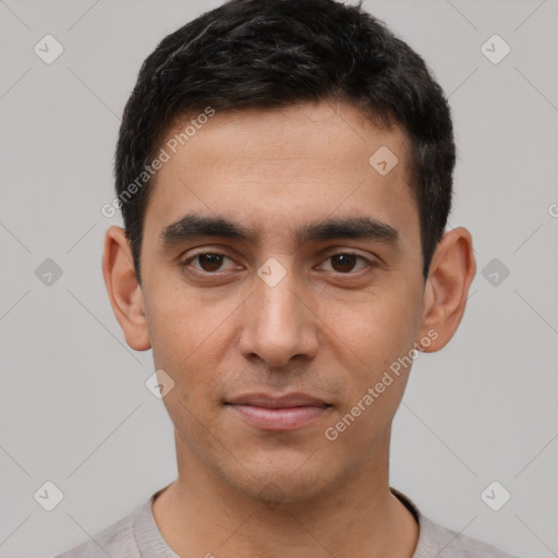 Joyful white young-adult male with short  black hair and brown eyes